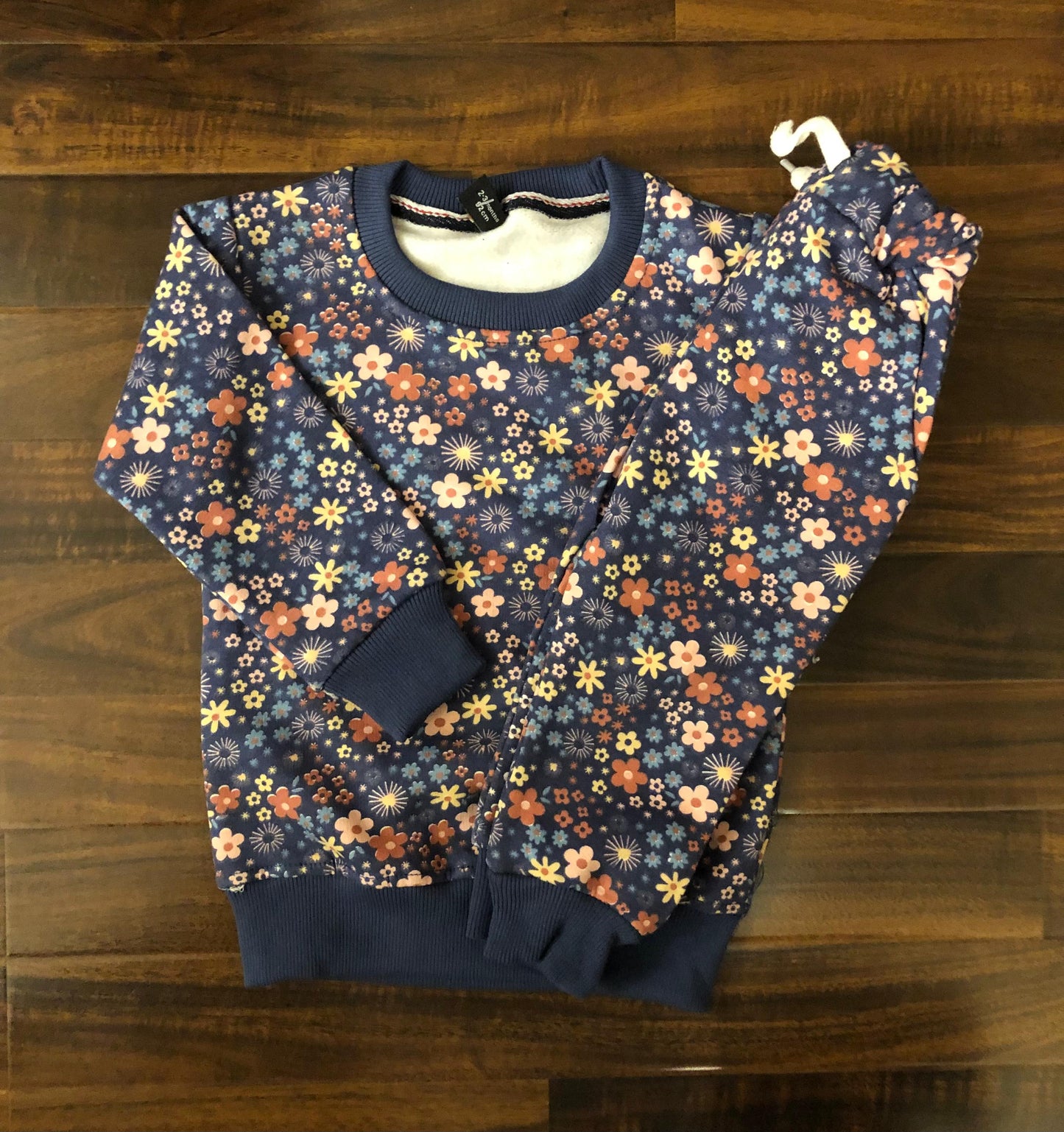 Black multi flowers tracksuit for kids