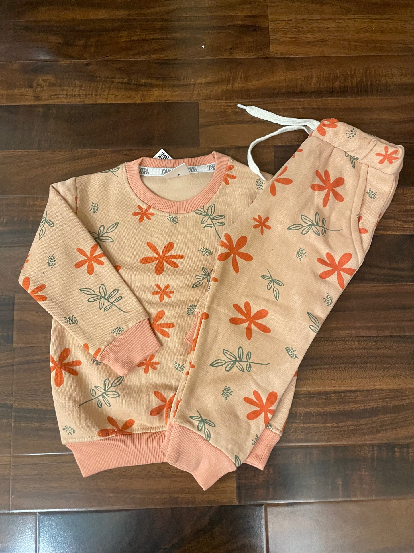 Peach floral design tracksuit for kids