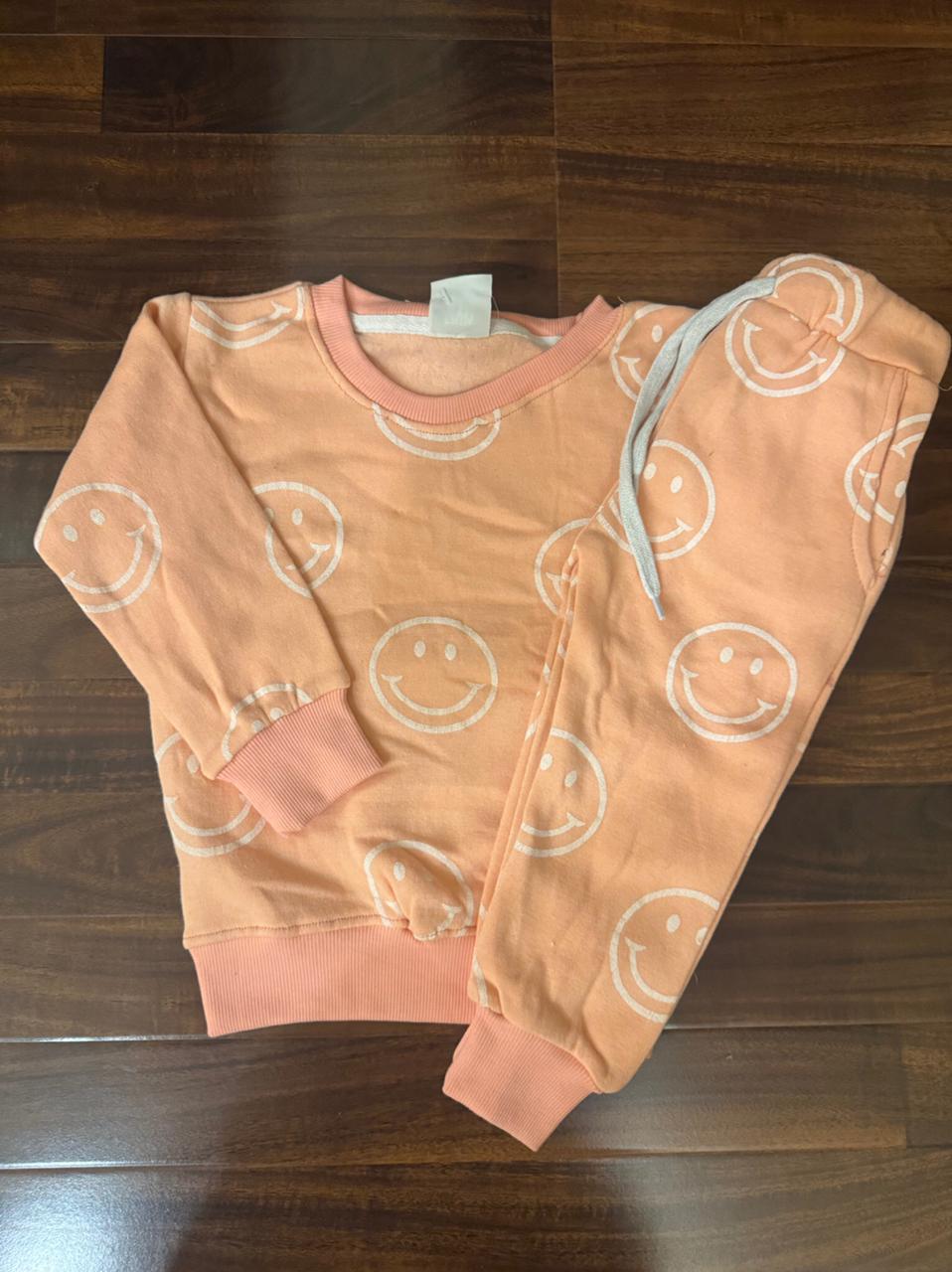 Peach smiley face tracksuit for kids